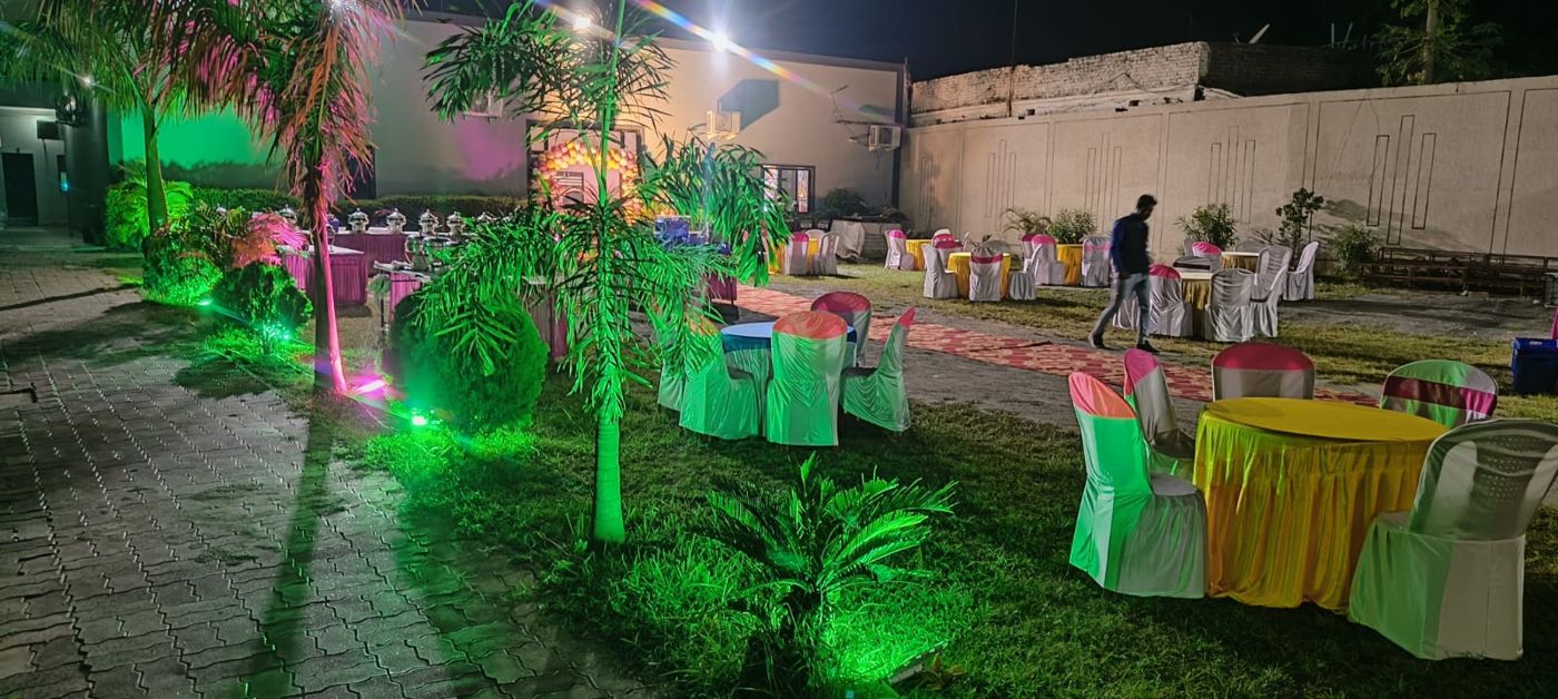 Vasundhara Garden — Lawn dining set-up with lights