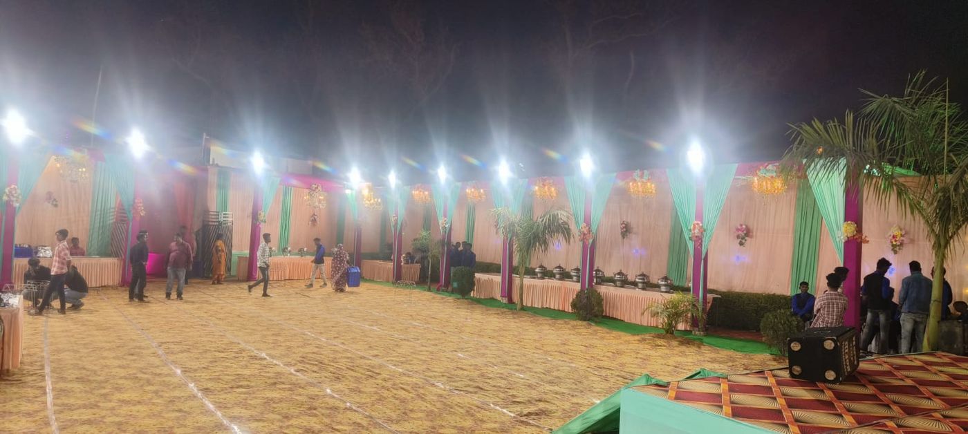 Vasundhara Garden — Lawn lit up for an evening event